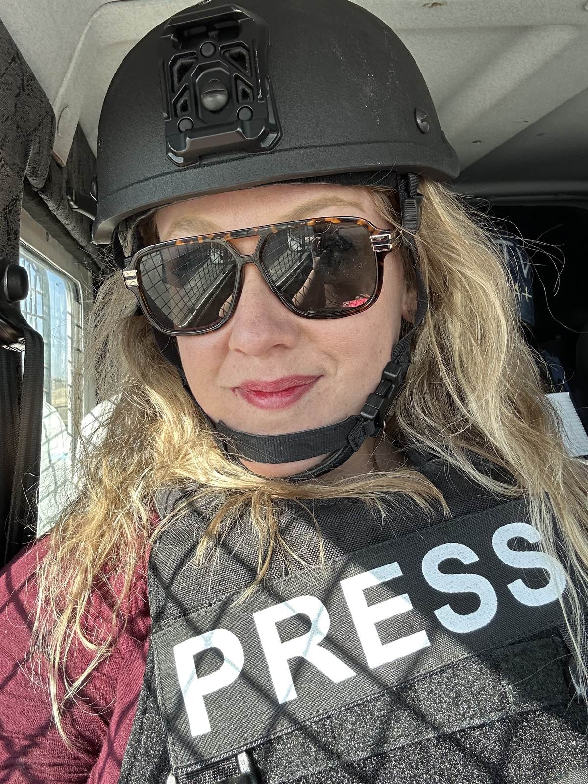 Caitlin Doornbos in press vest